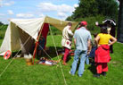 A few visitors being told about the Romans.