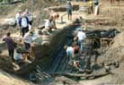 An enlarged picture of the 'De Meern 4' Roman ship, next to the quay (botom)of the picture.